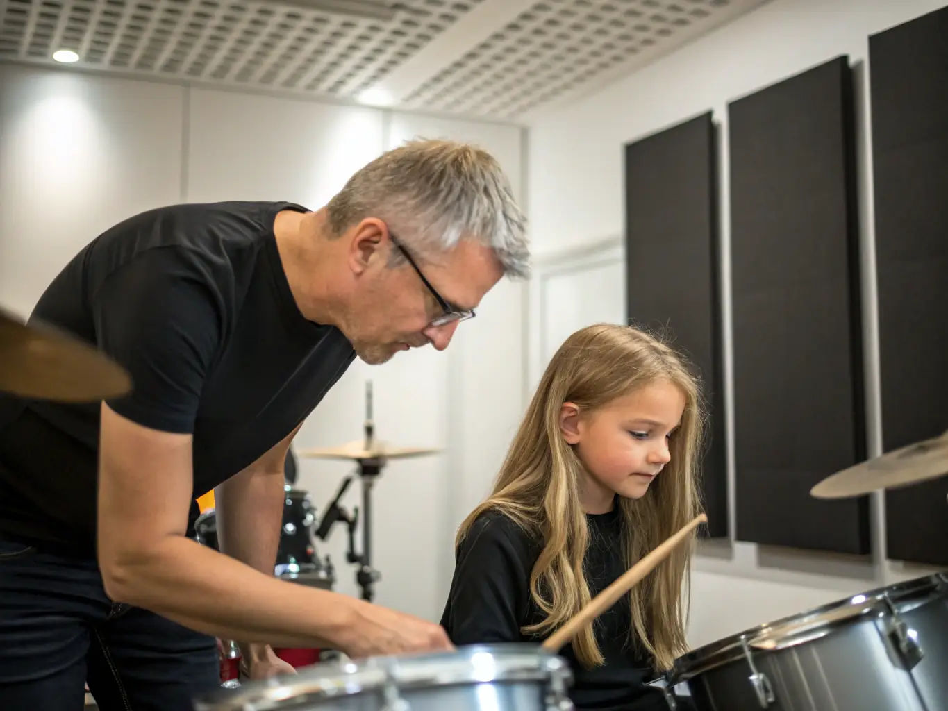 A musician mentoring a young student, guiding them through the process of learning an instrument and developing their musical talent, in a one-on-one session.